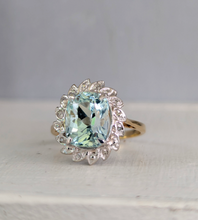 Load image into Gallery viewer, Aquamarine and diamond cluster halo c1990s in 9ct yellow and white gold