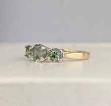 Load image into Gallery viewer, Green parti sapphire trilogy in 9ct yellow and white gold.