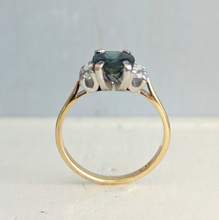 Load image into Gallery viewer, Tantalising teal blue Australian sapphire in heavy 18ct yellow and white gold