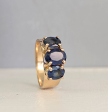 Load image into Gallery viewer, Striking natural blue sapphire trilogy in rosey 9ct yellow gold