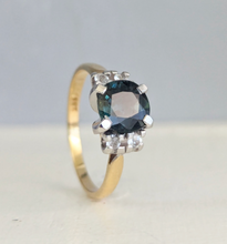 Load image into Gallery viewer, Tantalising teal blue Australian sapphire in heavy 18ct yellow and white gold