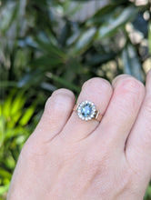 Load image into Gallery viewer, 1980s Halo ring with Teal sapphire and white spinel in 9ct yellow and white gold.