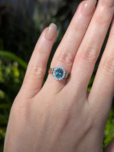 Load image into Gallery viewer, 1980s Halo ring with Teal sapphire and white spinel in 9ct yellow and white gold.
