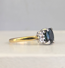 Load image into Gallery viewer, Tantalising teal blue Australian sapphire in heavy 18ct yellow and white gold