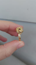 Load and play video in Gallery viewer, Vintage 18ct yellow gold knot ring or lovers knot