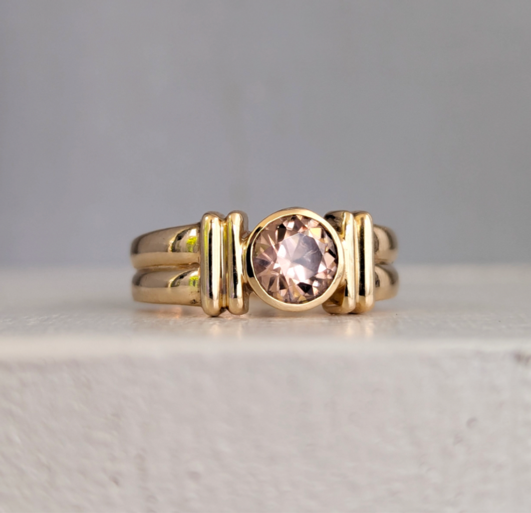 Warm radiant Harts Ranges zirocon in vintage 9ct yellow gold.
