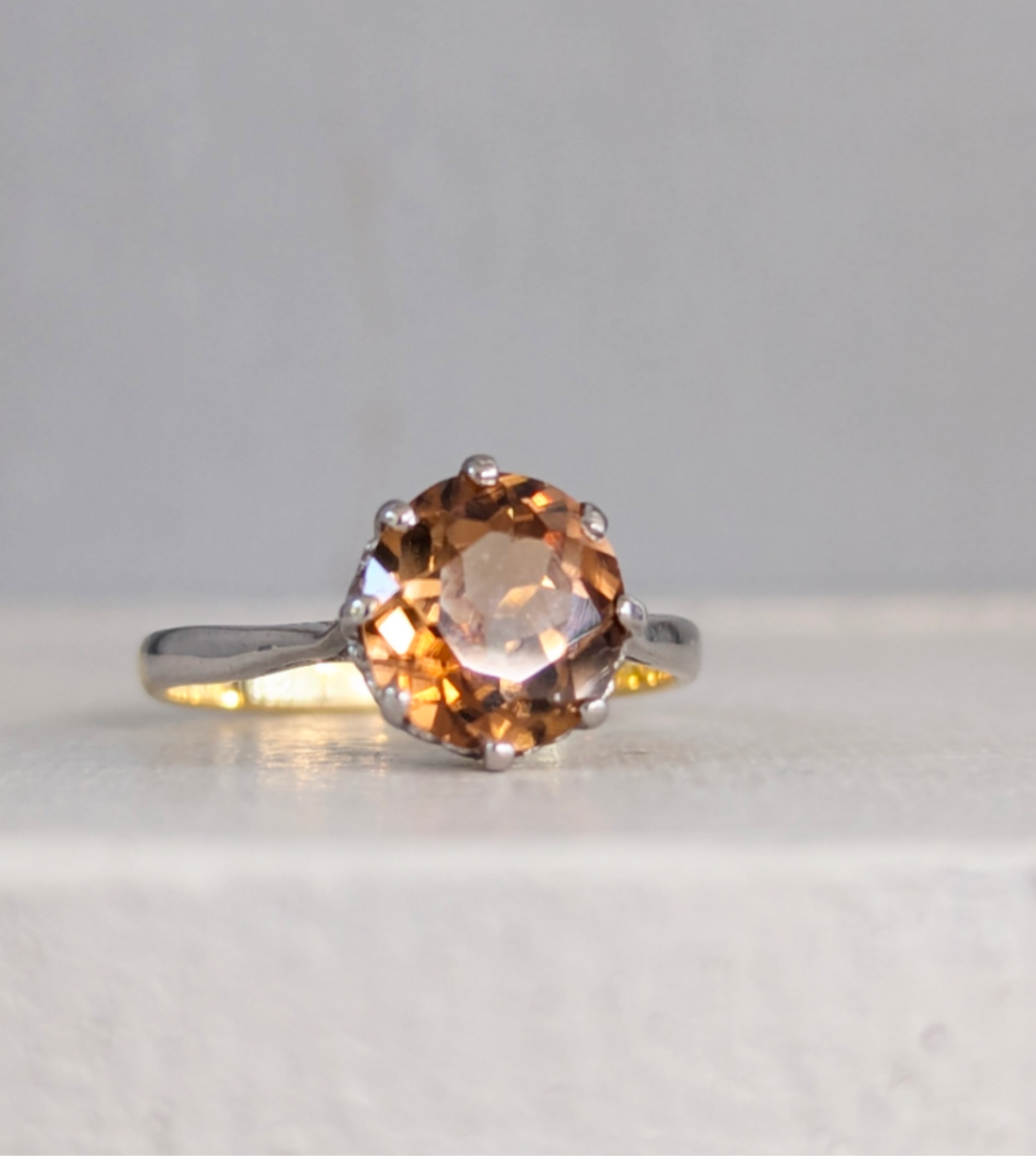 Earthy orange zircon in Art Deco 18ct gold setting