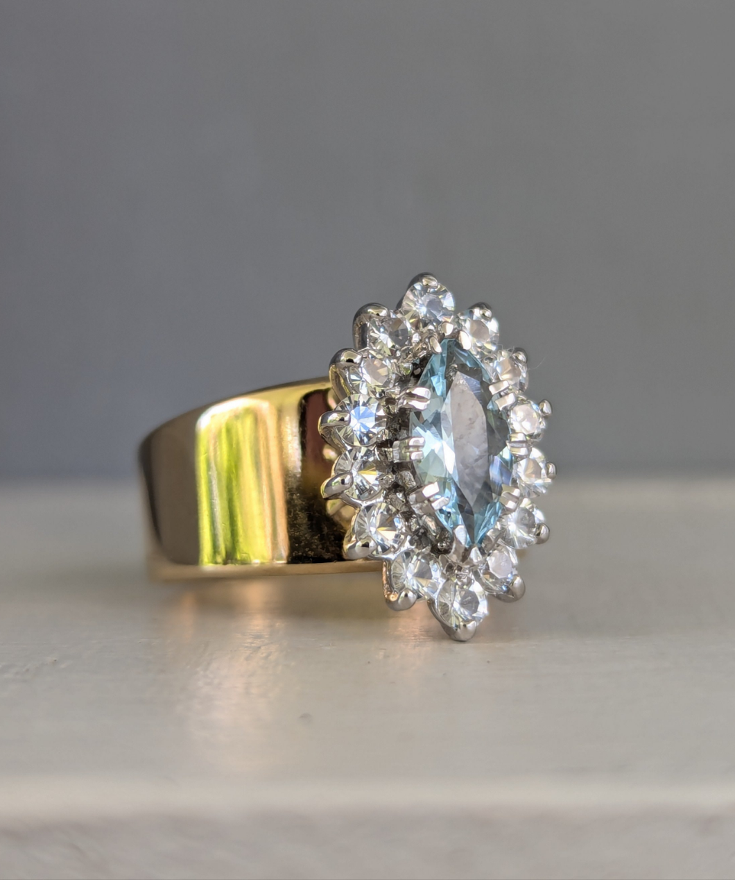 The Marquis de Aquamarine with spinel halo 9ct gold