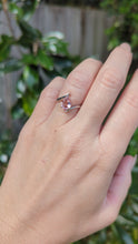 Load and play video in Gallery viewer, Pink cherry blossom tourmaline in 9ct white gold bypass ring
