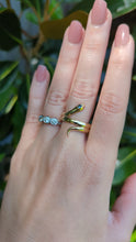 Load and play video in Gallery viewer, Serious serpent ring with parti sapphire 14k yellow gold
