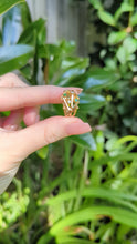 Load and play video in Gallery viewer, Brutalist c1970 diamond and emerald ring in 14ct yellow gold.
