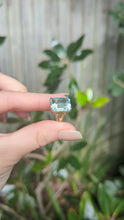 Load and play video in Gallery viewer, Vintage aquamarine cocktail ring c1960s in 9ct yellow gold.

