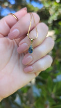 Load and play video in Gallery viewer, Bright natural blue sapphire in vintage 9ct yellow gold pendant

