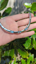 Load and play video in Gallery viewer, Vintage articulated sterling silver &amp; topaz omega chain
