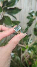 Load and play video in Gallery viewer, Vintage aquamarine cocktail ring c1960s in 9ct yellow gold.
