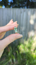 Load and play video in Gallery viewer, Wonderful handmade silver ribbon ring c1940s with mint tourmaline.
