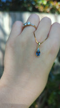 Load and play video in Gallery viewer, Bright natural blue sapphire in vintage 9ct yellow gold pendant
