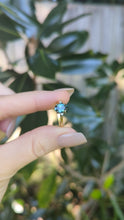 Load and play video in Gallery viewer, Bright blue Montana sapphire in c1930s ornate 9ct Australian ring.
