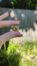 Load and play video in Gallery viewer, Sumptuous Harts Ranges zircon in wide vintage 9ct band
