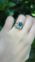 Load and play video in Gallery viewer, Tantalising teal blue Australian sapphire in heavy 18ct yellow and white gold
