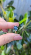 Load and play video in Gallery viewer, Tantalising teal blue Australian sapphire in heavy 18ct yellow and white gold
