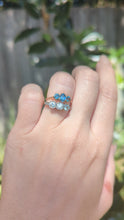 Load and play video in Gallery viewer, c1930s Australian sapphire trilogy in 9ct rosey yellow gold.
