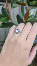 Load and play video in Gallery viewer, Glowing cosmic tanzanite in vintage 9ct yellow gold ring
