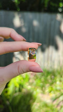 Load and play video in Gallery viewer, Sumptuous Harts Ranges zircon in wide vintage 9ct band

