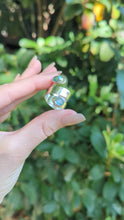 Load and play video in Gallery viewer, 'All wrapped up' vintage aquamarine cabochon ring in sterling silver.
