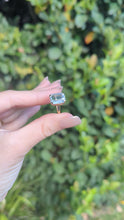 Load and play video in Gallery viewer, Serene bright pale blue aquamarine ring in 9ct yellow gold c1960s Birmighham
