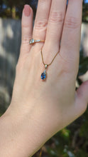 Load and play video in Gallery viewer, Bright natural blue sapphire in vintage 9ct yellow gold pendant

