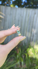 Load and play video in Gallery viewer, Wonderful handmade silver ribbon ring c1940s with mint tourmaline.

