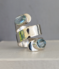 Load image into Gallery viewer, 'All wrapped up' vintage aquamarine cabochon ring in sterling silver.
