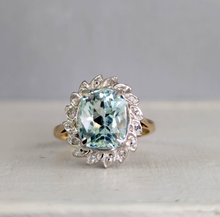 Load image into Gallery viewer, Aquamarine and diamond cluster halo c1990s in 9ct yellow and white gold
