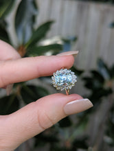 Load image into Gallery viewer, Aquamarine and diamond cluster halo c1990s in 9ct yellow and white gold
