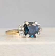 Load image into Gallery viewer, Tantalising teal blue Australian sapphire in heavy 18ct yellow and white gold
