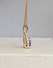 Load image into Gallery viewer, Bright natural blue sapphire in vintage 9ct yellow gold pendant
