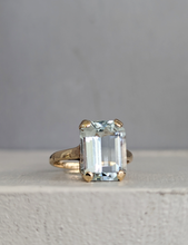Load image into Gallery viewer, Serene bright pale blue aquamarine ring in 9ct yellow gold c1960s Birmighham
