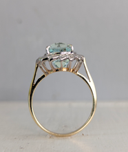 Load image into Gallery viewer, Aquamarine and diamond cluster halo c1990s in 9ct yellow and white gold
