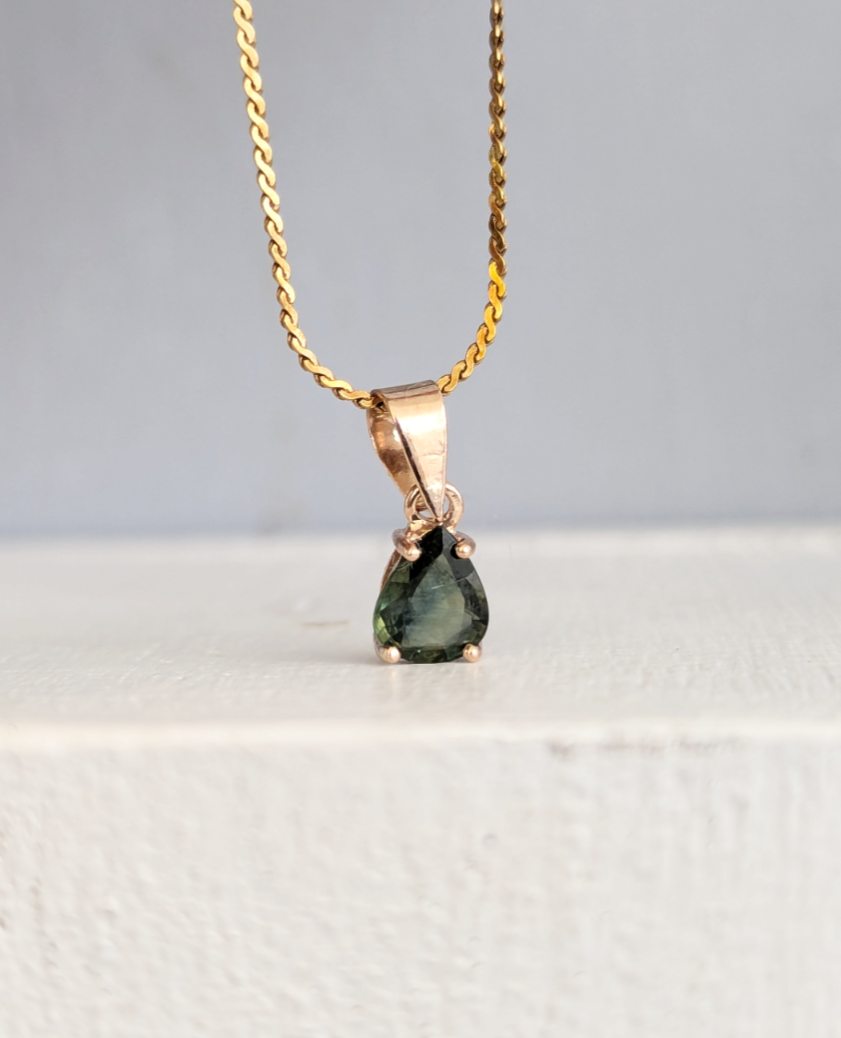 Green Pear sapphire in 9ct yellow gold pendant