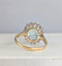 Load image into Gallery viewer, Aquamarine and diamond cluster halo c1990s in 9ct yellow and white gold
