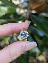 Load image into Gallery viewer, 1980s Halo ring with Teal sapphire and white spinel in 9ct yellow and white gold.
