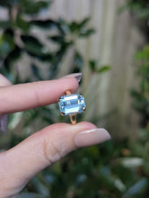 Load image into Gallery viewer, Serene bright pale blue aquamarine ring in 9ct yellow gold c1960s Birmighham
